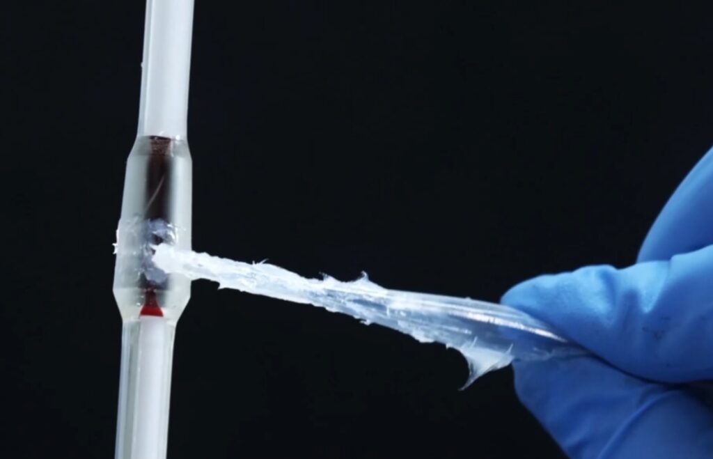 Applying vacuum grease to a male ground glass joint using the streak method to ensure a proper seal