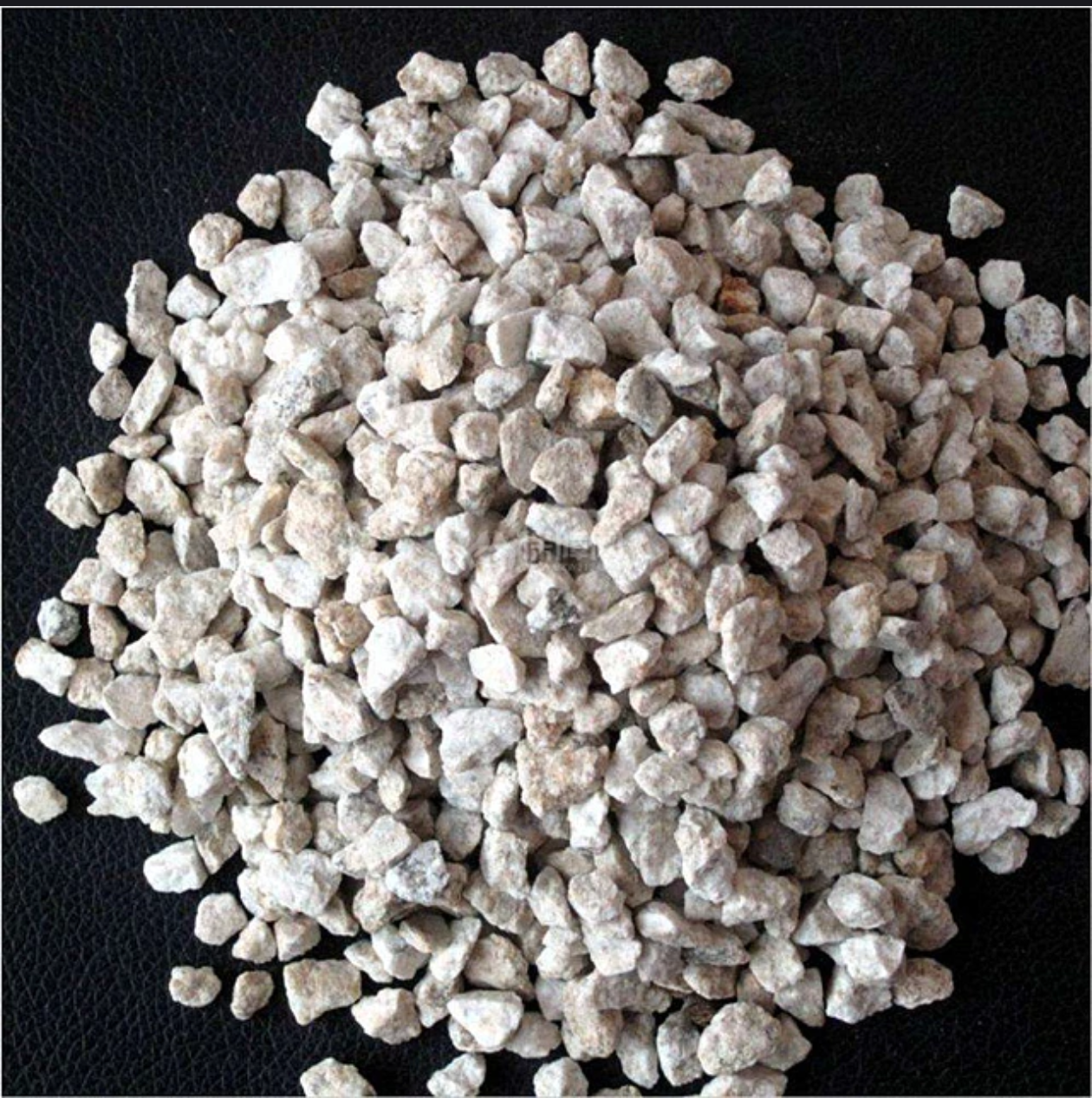 Porous boiling stone used as a nucleation aid in organic chemistry